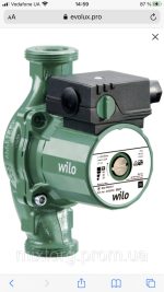 Циркуляційний насос WILO-STAR-RS 25/4 на фоні.